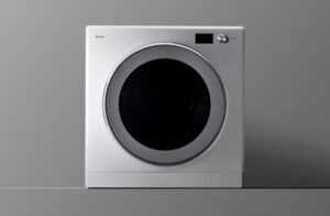白を基調としたドラム式衣類乾燥機の本体を正面から撮影したシンプルなイメージ。大きな円形ドアと操作パネルを備え、乾燥機のデザインや外観が分かる構図
